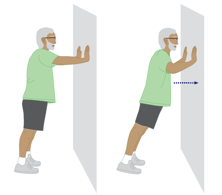 Two-panel illustration demonstrating a standing wall push-up. In the first panel, a person stands facing a wall with arms extended and hands placed flat against the wall at shoulder height. In the second panel, the person bends the elbows and leans the body toward the wall while keeping the body in a straight line from head to heels. A blue arrow indicates the forward movement toward the wall.